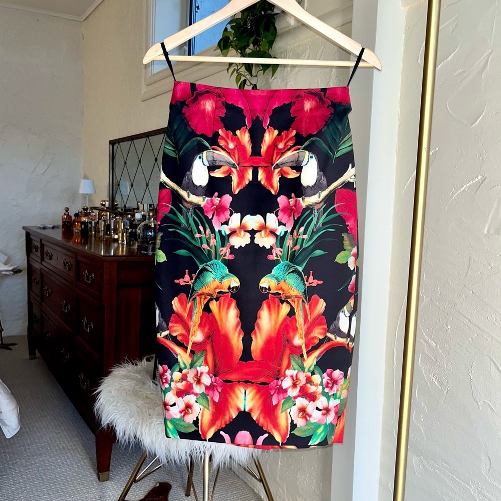 Ted Baker knee length skirt with red green contrasting pattern and gold zipper